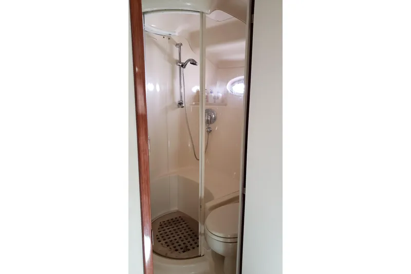 Slide: The Image of Shower and toilet area in 2004 Sea Ray 550 Sundancer yacht. - 38
