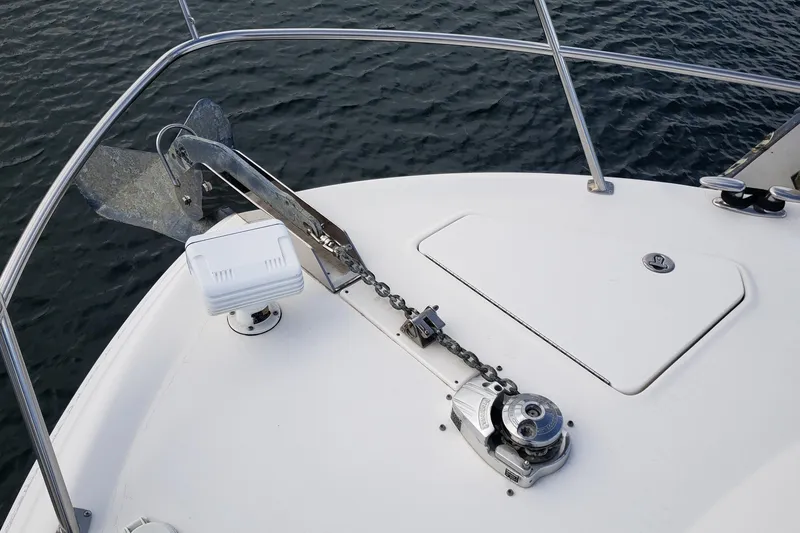 Slide: The Image of Bow of 2004 Sea Ray 550 Sundancer with anchor and chain mechanism. - 45