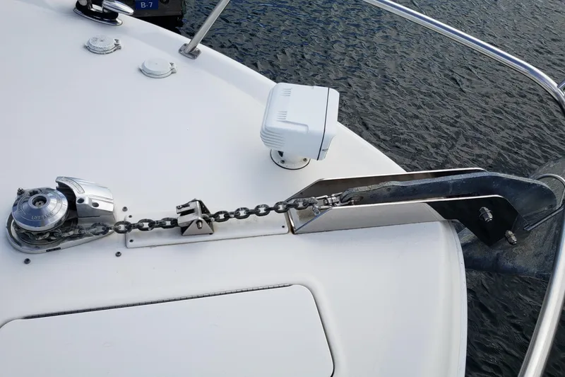 Slide: The Image of Bow of 2004 Sea Ray 550 Sundancer with anchor chain and winch system. - 47