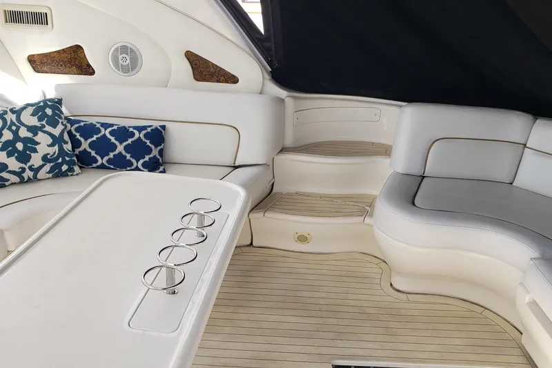 Slide: The Image of Luxurious interior of 2004 Sea Ray 550 Sundancer yacht with plush seating and elegant decor. - 5