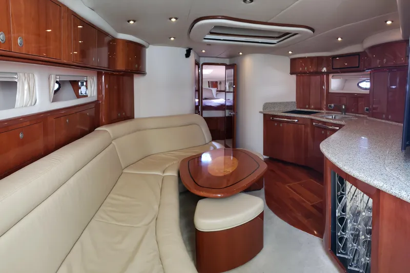 Slide: The Image of Luxurious interior of 2004 Sea Ray 550 Sundancer yacht with elegant wood finishes. - 62