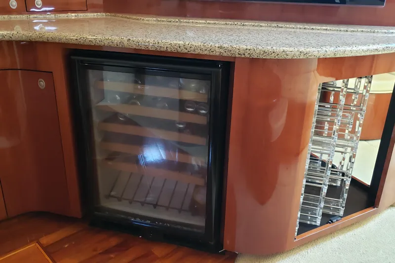 Slide: The Image of Luxury yacht interior with a built-in wine cooler, Sea Ray 550 Sundancer, 2004 model. - 66