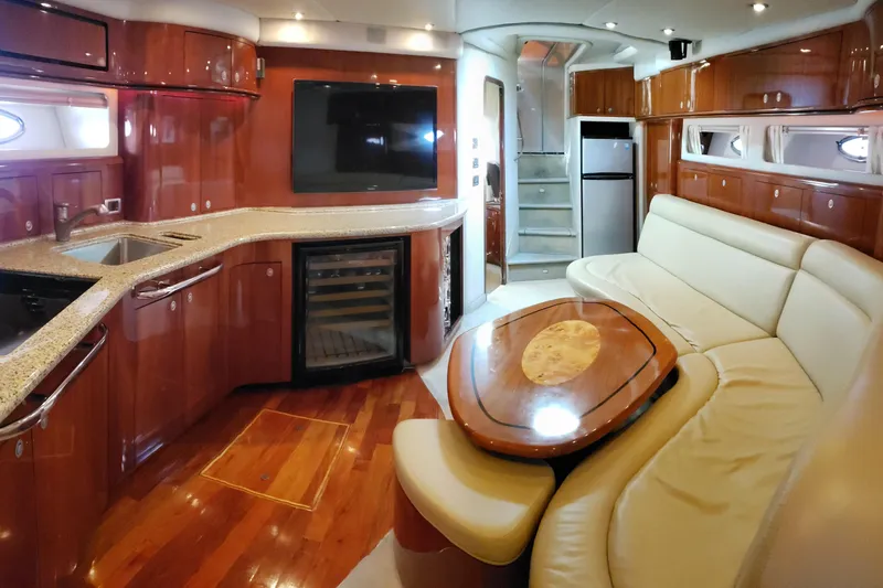Slide: The Image of Luxurious interior of 2004 Sea Ray 550 Sundancer yacht with elegant wood finishes. - 67