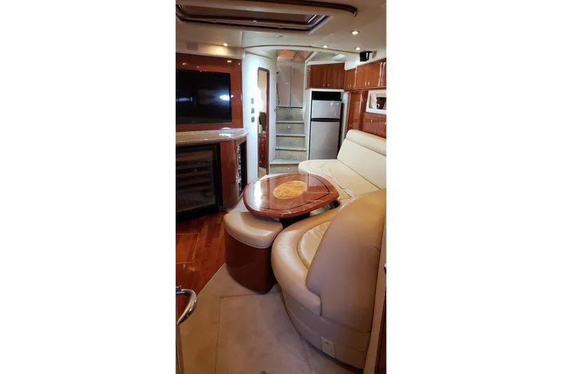 Slide: The Image of Luxurious interior of 2004 Sea Ray 550 Sundancer yacht with leather seating and modern amenities. - 68