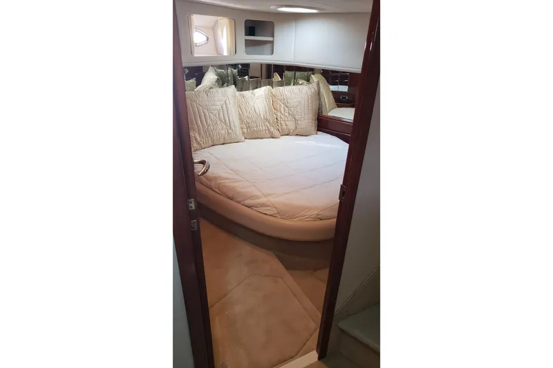 Slide: The Image of Luxurious bedroom interior of 2004 Sea Ray 550 Sundancer yacht. - 75