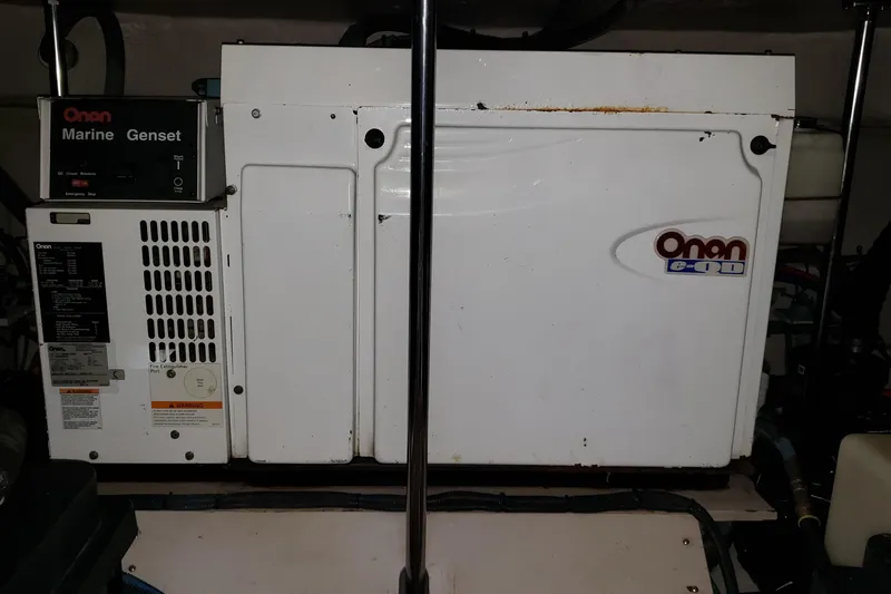 Slide: The Image of Onan marine generator in 2004 Sea Ray 550 Sundancer engine room. - 88