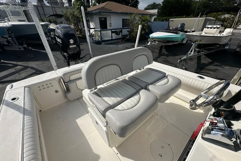 Slide: The Image of 2018 Sea Born FX25 Bay boat interior with dual seating and steering wheel. - 20