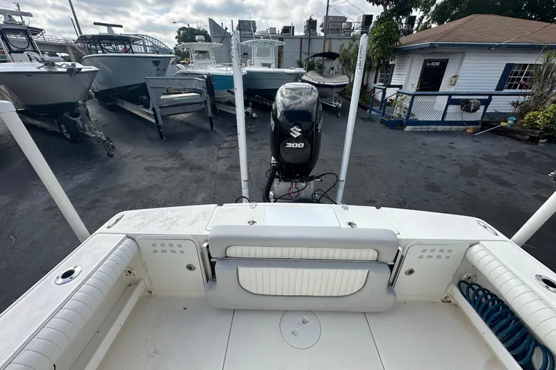 Slide: The Image of 2018 Sea Born FX25 Bay boat with Suzuki 300 engine at a marina. - 23