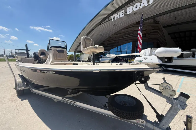 Slide: The Image of 2016 Blue Wave 2200 PureBay boat on trailer outside dealership. - 12