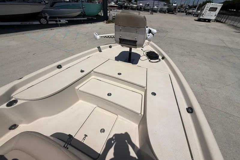 Slide: The Image of 2016 Blue Wave 2200 PureBay boat deck with storage compartments and seating. - 19