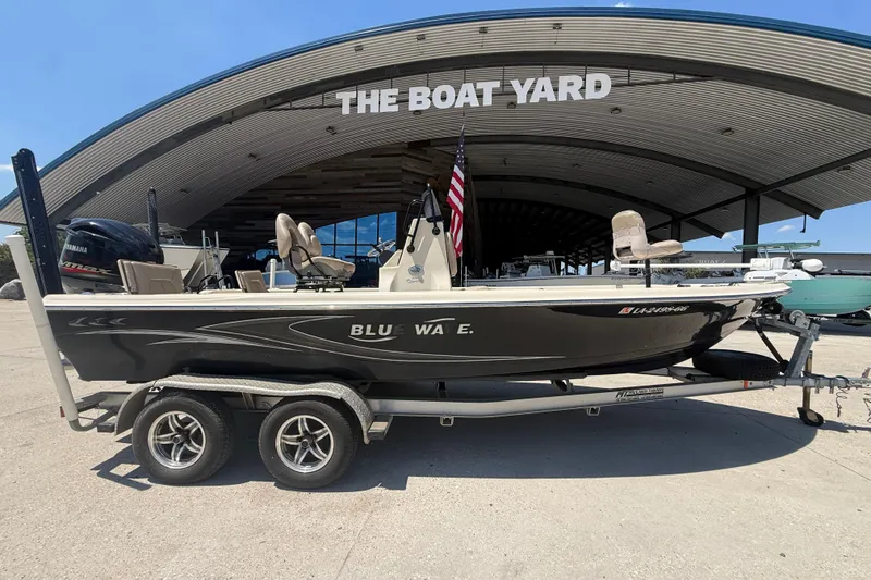 Slide: The Image of 2016 Blue Wave 2200 PureBay boat on trailer at The Boat Yard. - 20
