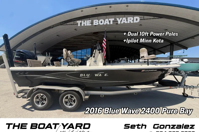 The Image of 2016 Blue Wave 2400 Pure Bay boat with dual 10ft power poles at The Boat Yard. - 6
