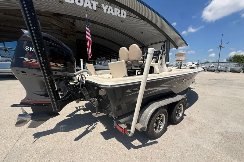 Slide: The Image of 2016 Blue Wave 2200 PureBay boat on trailer at boat yard, sunny day. - 7