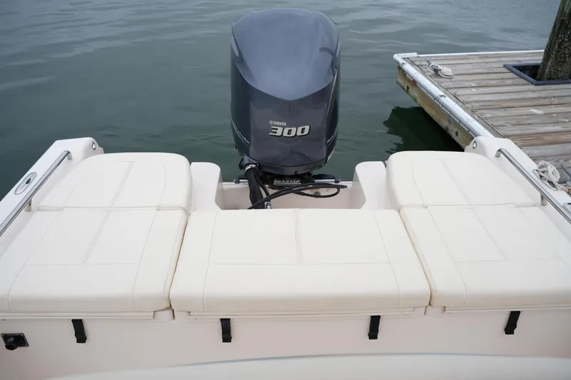 Slide: The Image of 2015 Grady-White 251 Coastal Explorer boat with Yamaha 300 engine at dock. - 17