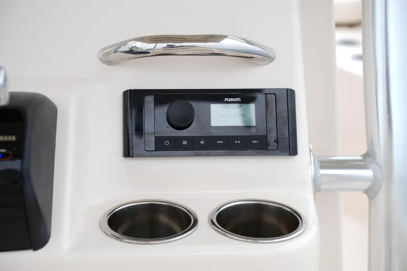 Slide: The Image of Control panel of 2015 Grady-White 251 Coastal Explorer with Fusion stereo system. - 24