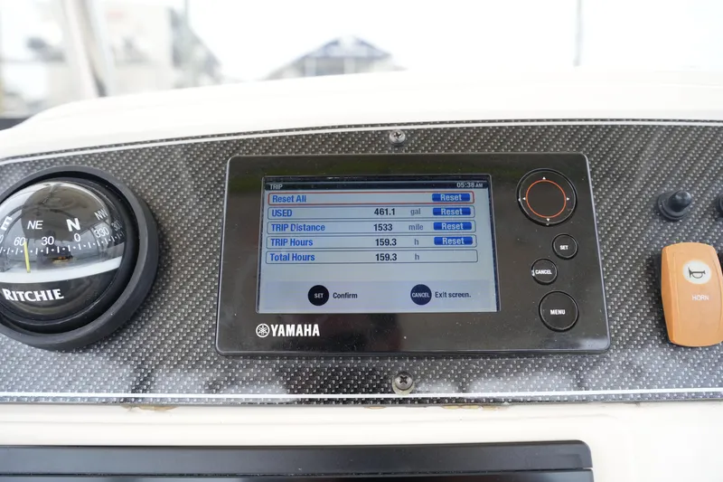 Slide: The Image of Dashboard of 2015 Grady-White 251 Coastal Explorer with Yamaha display and Ritchie compass. - 29