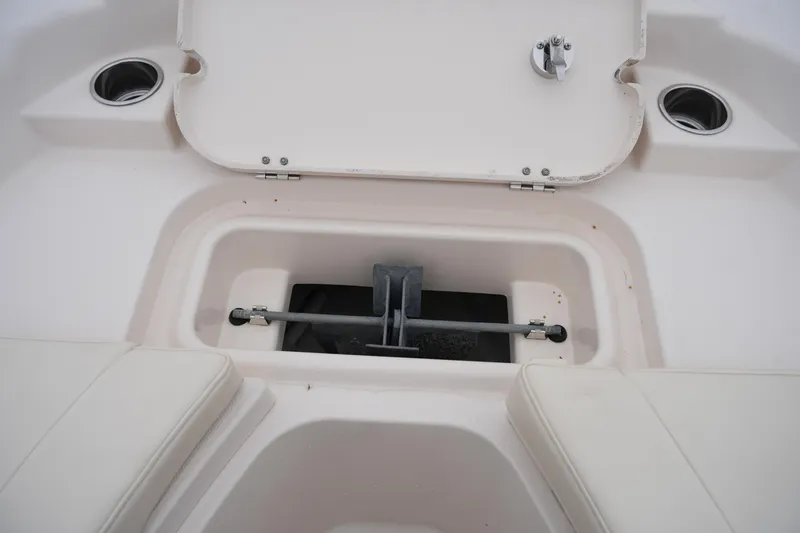 Slide: The Image of 2015 Grady-White 251 Coastal Explorer boat anchor storage compartment with open hatch. - 39