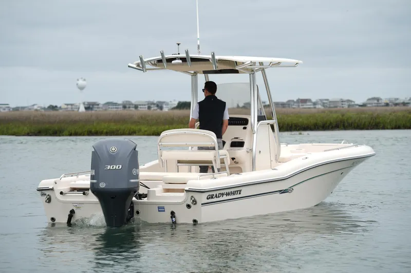 Slide: The Image of 2015 Grady-White 251 Coastal Explorer boat on water, rear view with Yamaha engine. - 5