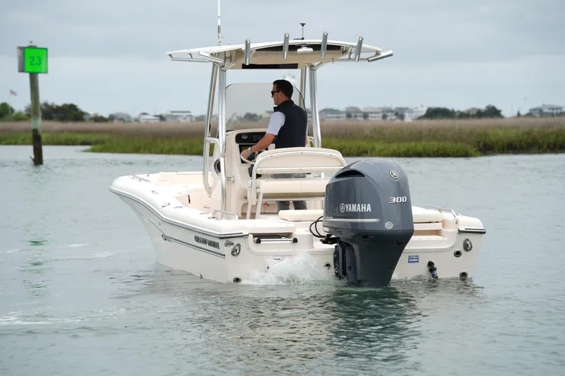 Slide: The Image of 2015 Grady-White 251 Coastal Explorer boat with Yamaha 300 engine on calm water. - 8
