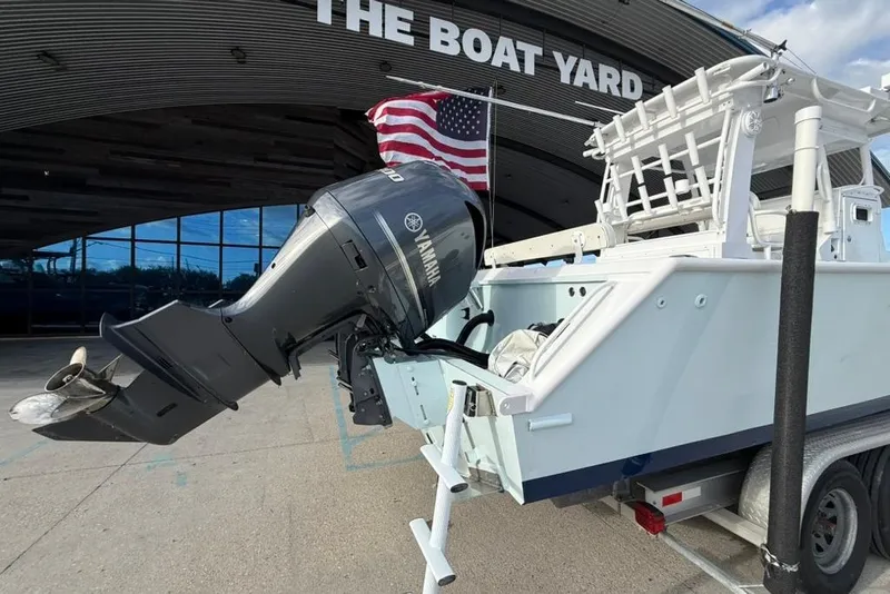Slide: The Image of 2012 Custom 32 CC boat with Yamaha outboard motor at The Boat Yard. - 9