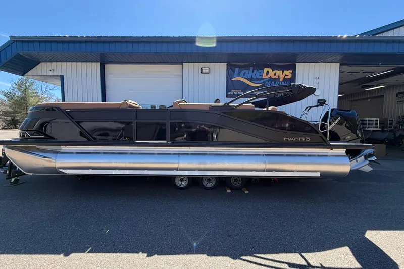 The Image of 2026 Harris Grand Mariner 250 SL pontoon boat parked at Lake Days Marine. - 1