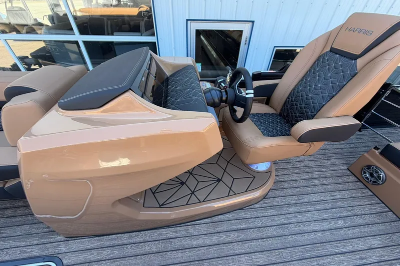 Slide: The Image of 2026 Harris Grand Mariner 250 SL helm with luxurious seating and modern design. - 15