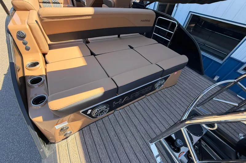Slide: The Image of 2026 Harris Grand Mariner 250 SL boat interior with luxurious seating and cup holders. - 21