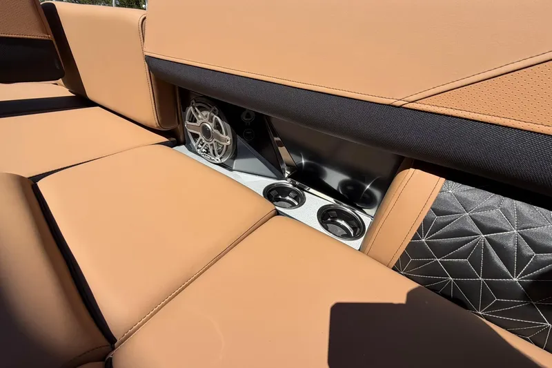 Slide: The Image of Luxurious seating and speaker detail in 2026 Harris Grand Mariner 250 SL boat. - 25