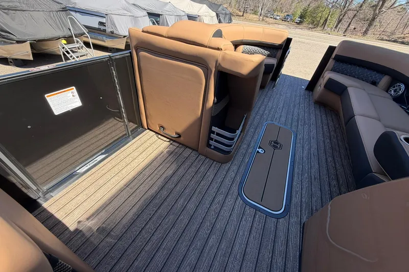 Slide: The Image of Interior of 2026 Harris Grand Mariner 250 SL pontoon boat with luxurious seating and flooring. - 29