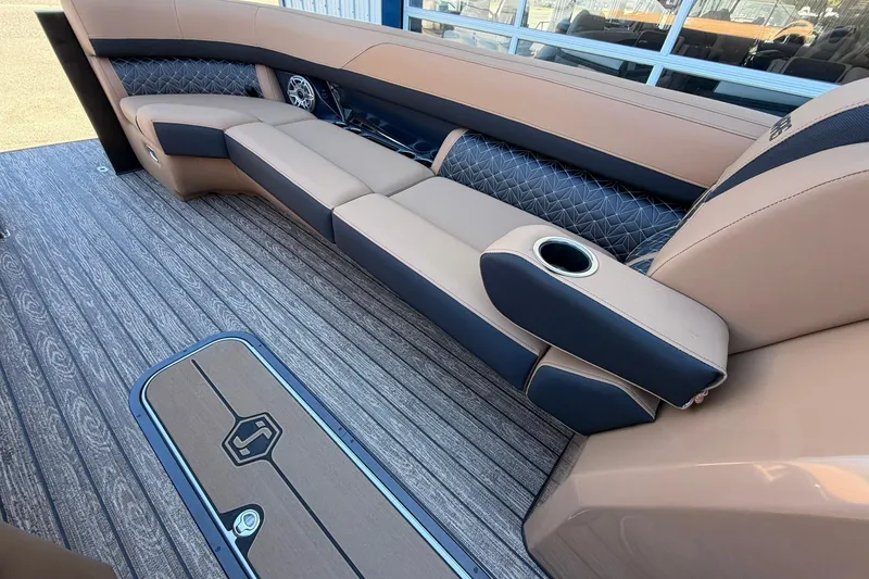 Slide: The Image of Luxurious seating on 2026 Harris Grand Mariner 250 SL boat with stylish upholstery and flooring. - 31