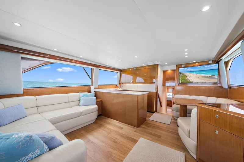 Slide: The Image of Luxurious interior of Viking 55 Convertible yacht with ocean view and modern furnishings. - 2