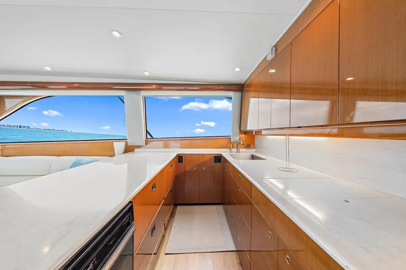 Slide: The Image of Luxurious kitchen interior of 1998 Viking 55 Convertible yacht with ocean view. - 5