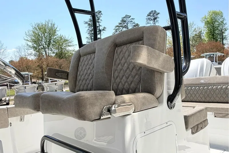 Slide: The Image of 2026 Sea Hunt Ultra 285 Coffin Box boat seating with diamond-stitched upholstery. - 10