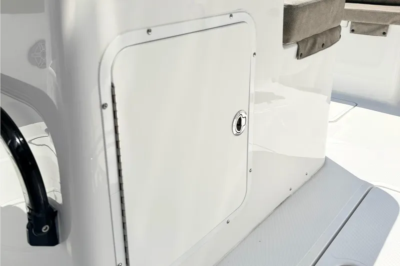 Slide: The Image of 2026 Sea Hunt Ultra 285 Coffin Box boat storage compartment detail. - 11