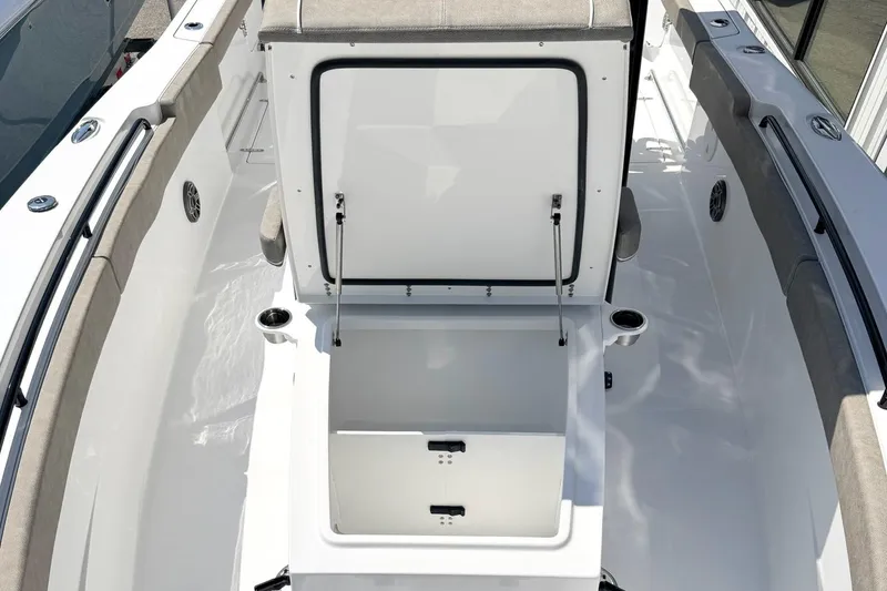 Slide: The Image of 2026 Sea Hunt Ultra 285 Coffin Box interior with open storage compartment. - 20