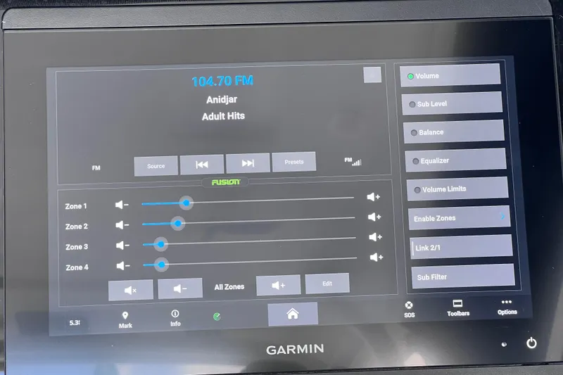 Slide: The Image of Touchscreen audio control panel on a 2023 Blackfin 272 DC boat, displaying FM radio settings. - 108