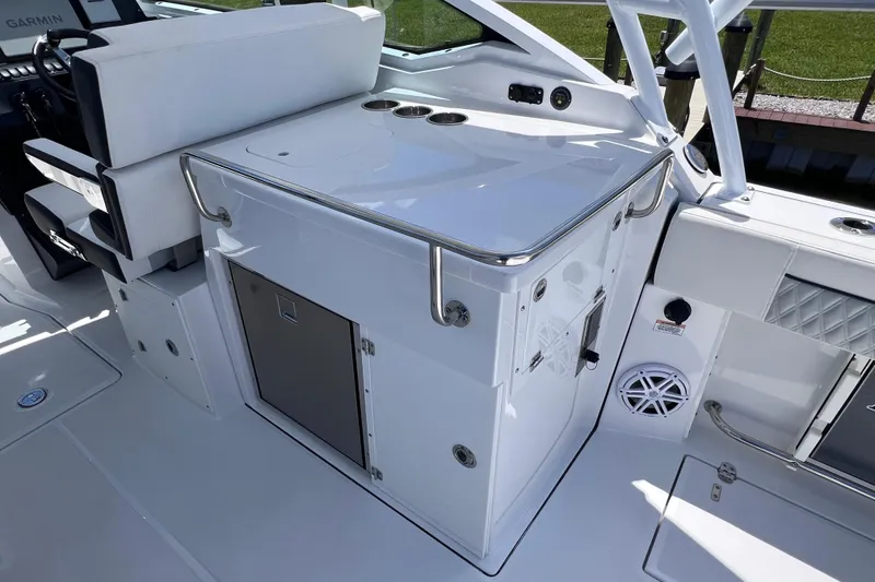 Slide: The Image of 2023 Blackfin 272 DC boat interior with seating and storage area. - 36