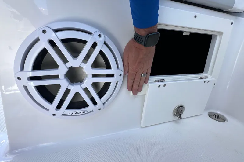 Slide: The Image of 2023 Blackfin 272 DC boat speaker and storage compartment detail. - 48