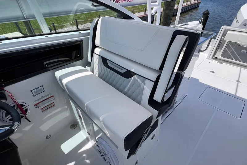 Slide: The Image of 2023 Blackfin 272 DC boat interior with luxurious seating and modern design. - 50