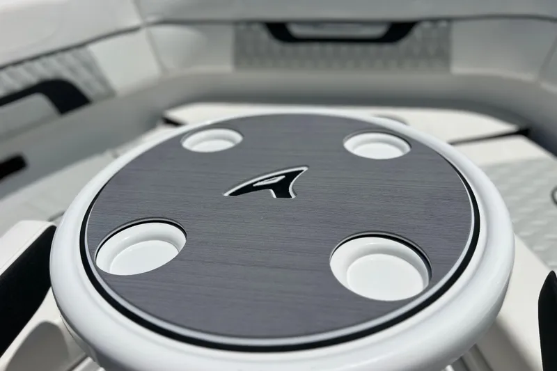 Slide: The Image of Close-up of 2023 Blackfin 272 DC boat's sleek cup holder design. - 56