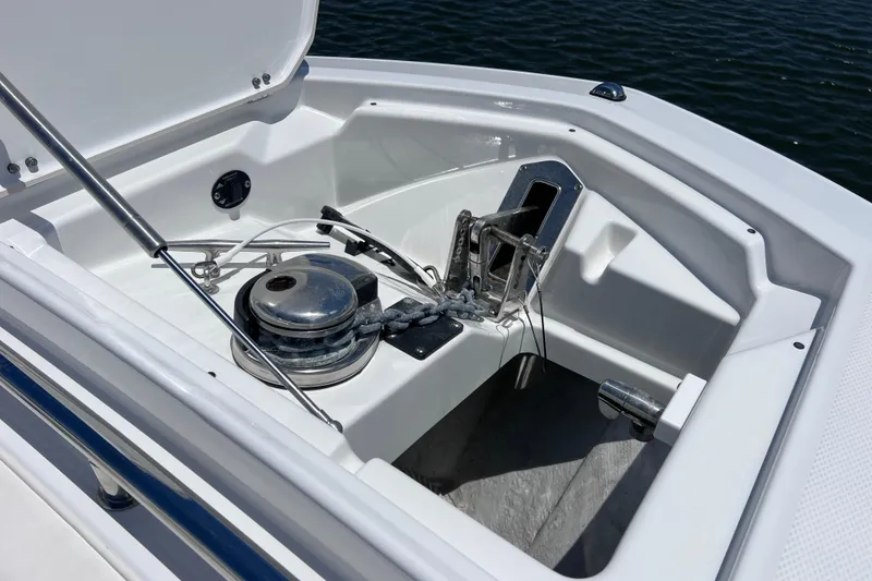 Slide: The Image of Anchor compartment of 2023 Blackfin 272 DC boat, featuring a sleek design and modern equipment. - 62