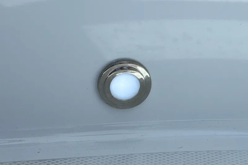 Slide: The Image of Close-up of a 2023 Blackfin 272 DC boat's stainless steel fitting. - 65