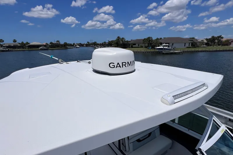 Slide: The Image of 2023 Blackfin 272 DC boat with Garmin radar on a sunny day. - 71