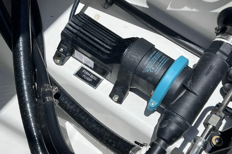 Slide: The Image of Fish box pump in 2023 Blackfin 272 DC boat, featuring durable hoses and secure fittings. - 75