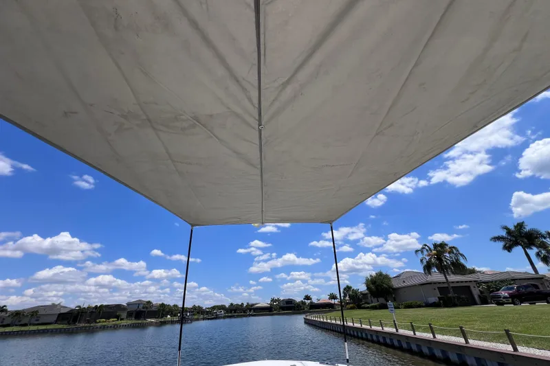 Slide: The Image of Boat canopy view on a sunny day, Blackfin 272 DC, 2023 model. - 80