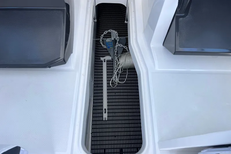 Slide: The Image of 2023 Blackfin 272 DC boat deck with anchor chain and storage compartment. - 86