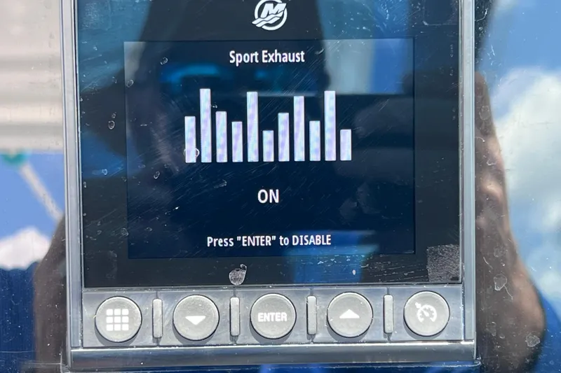 Slide: The Image of Display screen showing "Sport Exhaust" settings on a 2023 Blackfin 272 DC boat. - 94