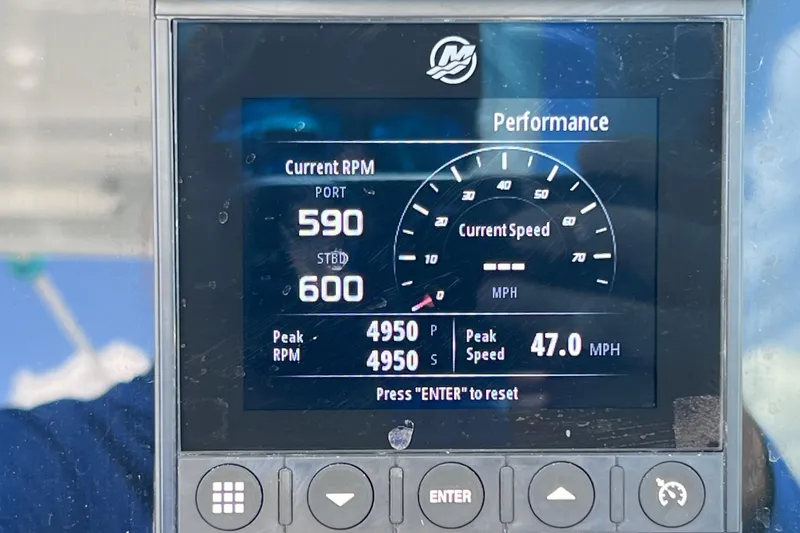 Slide: The Image of Display screen showing Blackfin 272 DC boat performance metrics, including RPM and speed. - 96