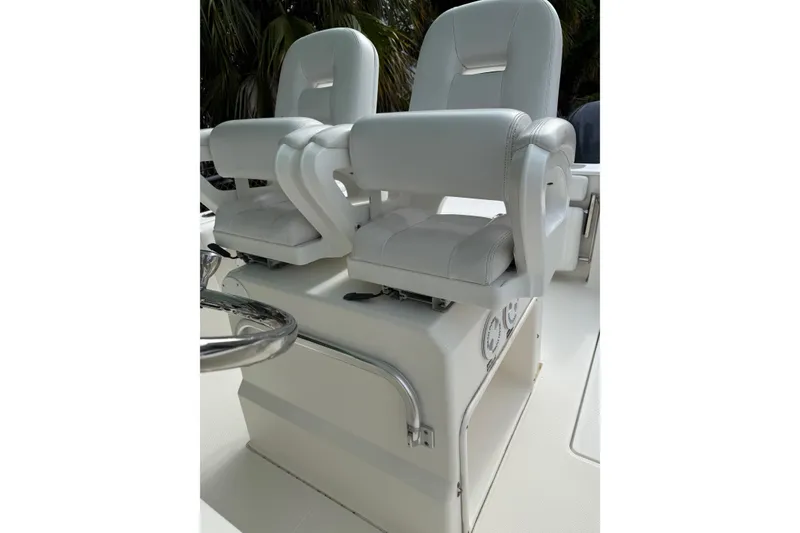Slide: The Image of White leather seats on a 2013 Sea Fox 286 Center Console boat. - 10