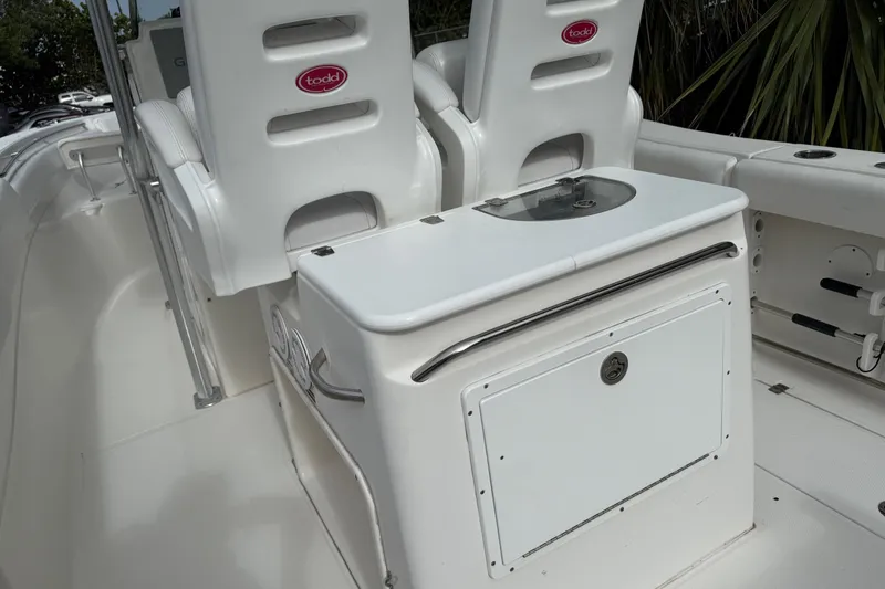 Slide: The Image of 2013 Sea Fox 286 Center Console interior with seating and storage features. - 12